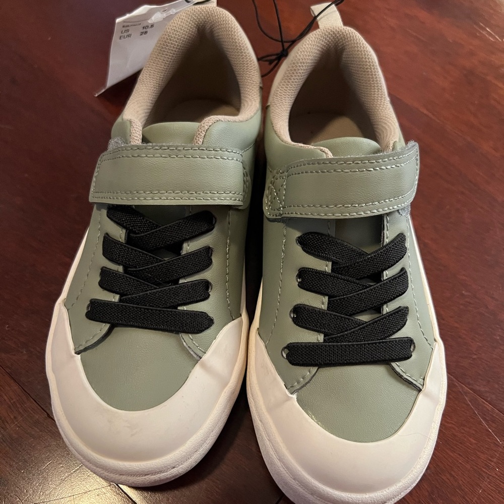 Khaki green sneakers in faux leather with reinforced toe cap. New with tags.